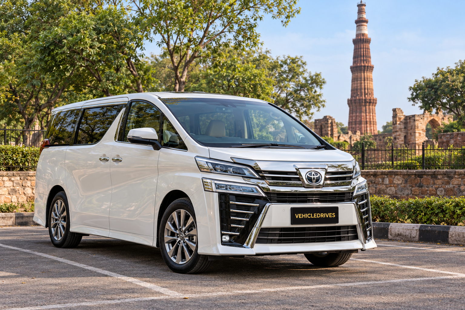pearl white vellfire at qutub minar 2