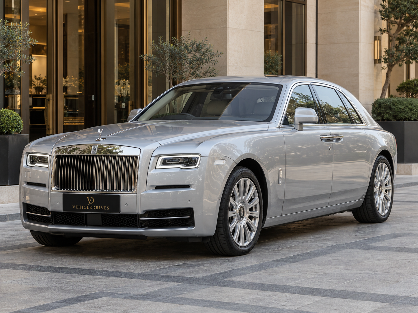 silver rolls royce ghost at a delhi hotel
